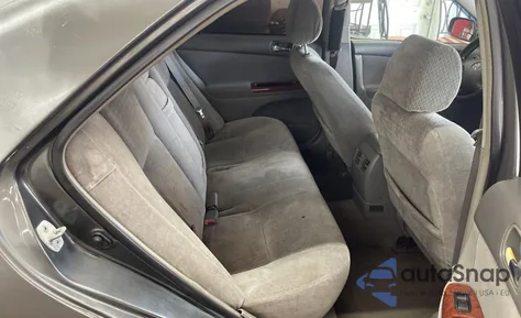 2002 Toyota Camry Le z USA, uszkodzony, nr VIN 4T1BE30K52U542523